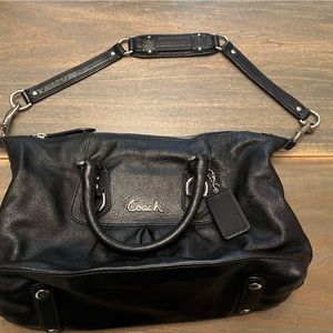 Black leather Coach purse.